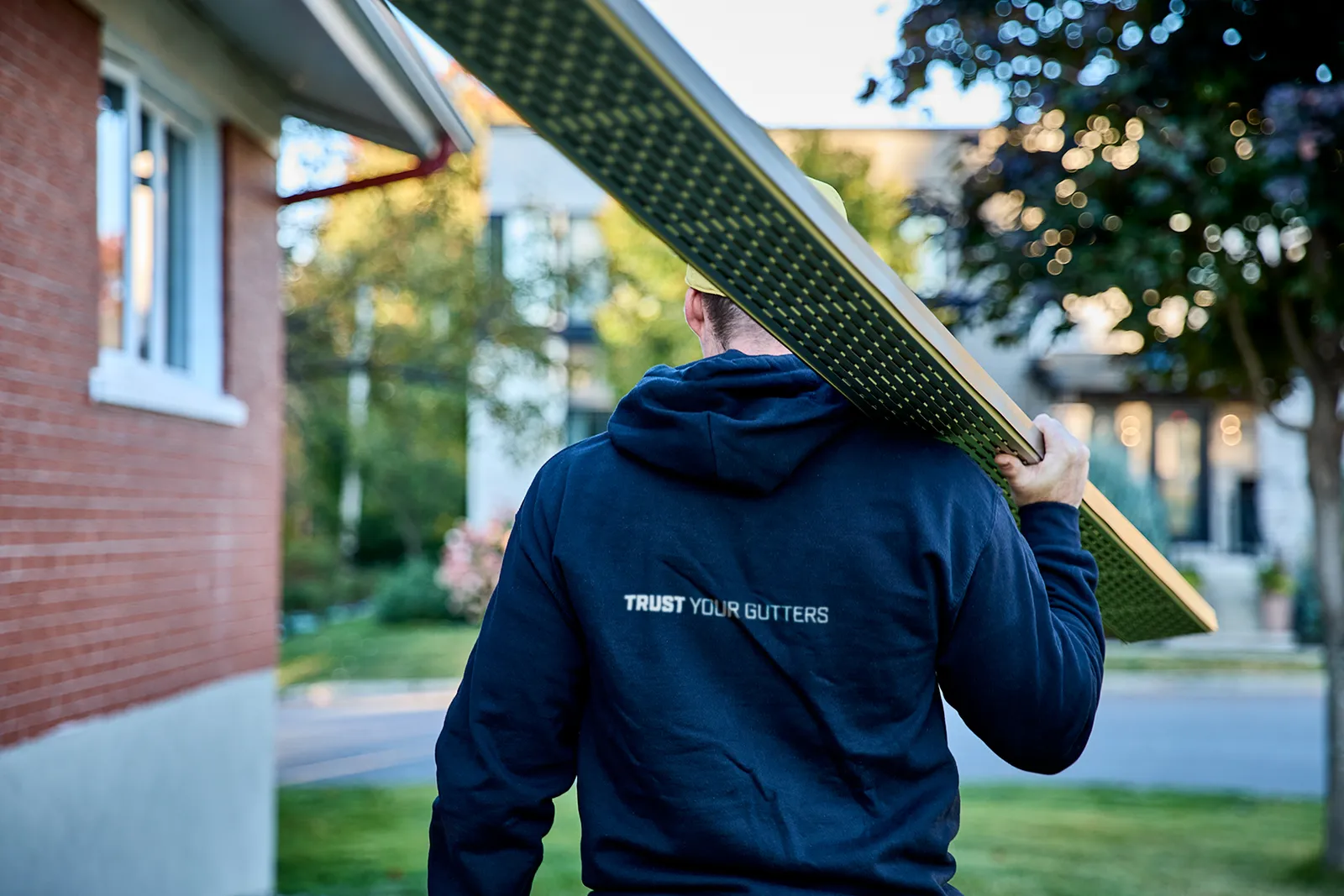 Seamless gutters and soffit around a bay window — Rideau Rain Gutter, Harrowsmith BC